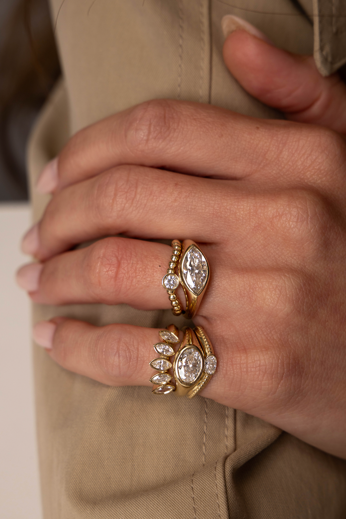 Three ARISH rings arranged in a wooden box