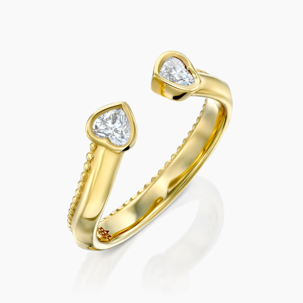 MATCH Hearts Ring in yellow gold with two heart-shaped diamonds, angled view